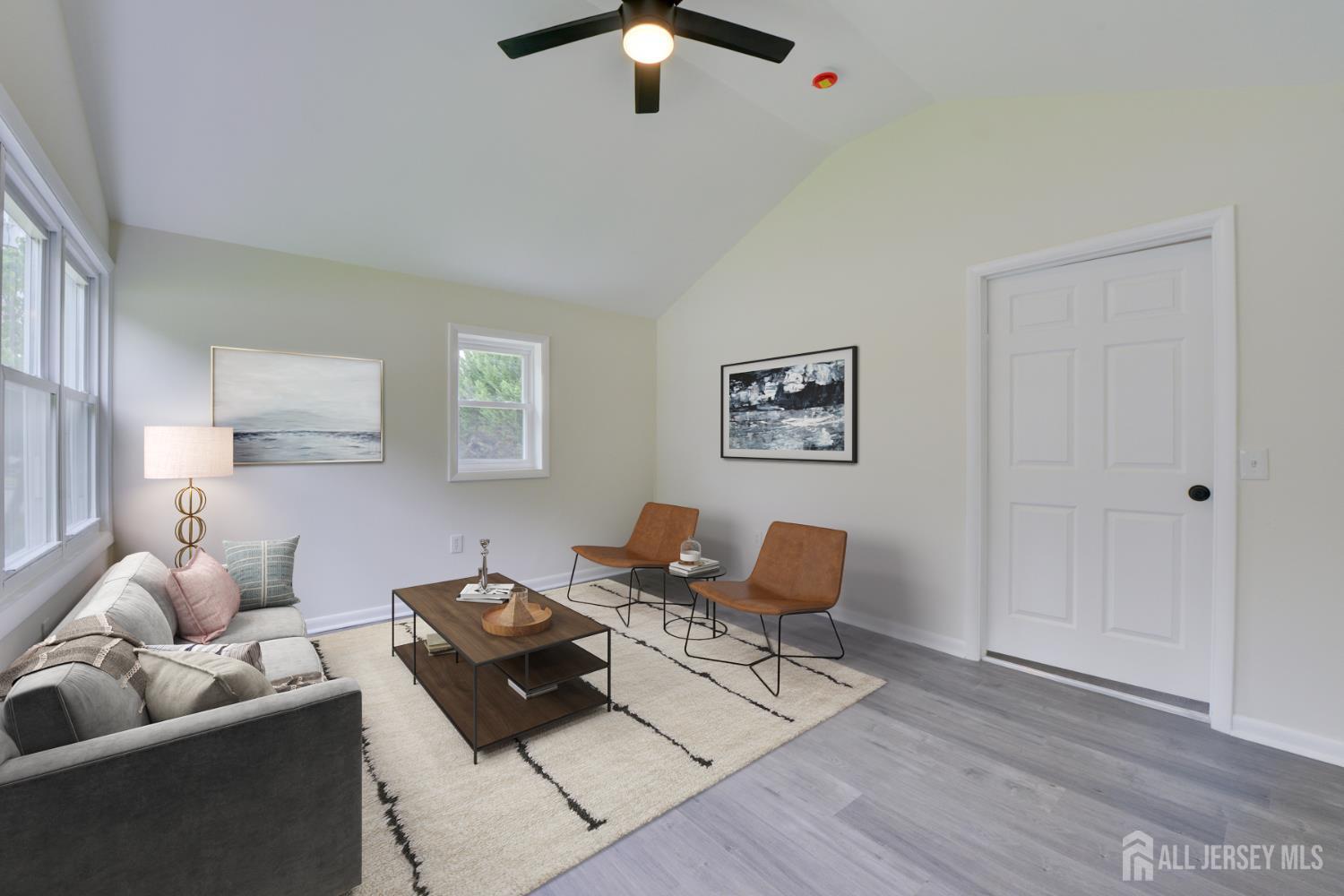 6 Main Street Helmetta, NJ 08828 - Photo 6 of 27 a living room with furniture and a wooden floor