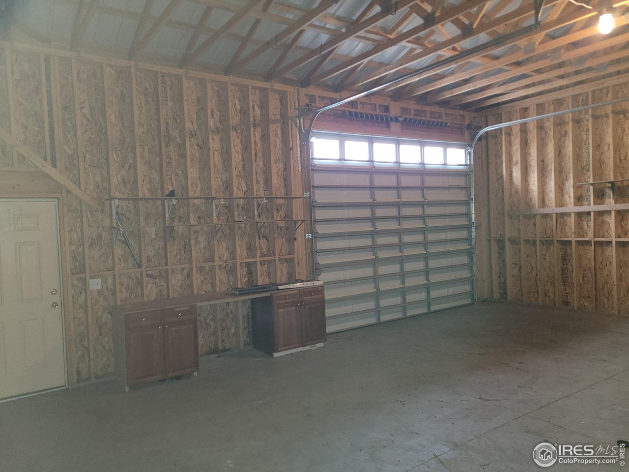 1701 Devils Gulch Road Estes Park, CO 80517 - Photo 28 of 48 overhead door in detached shop