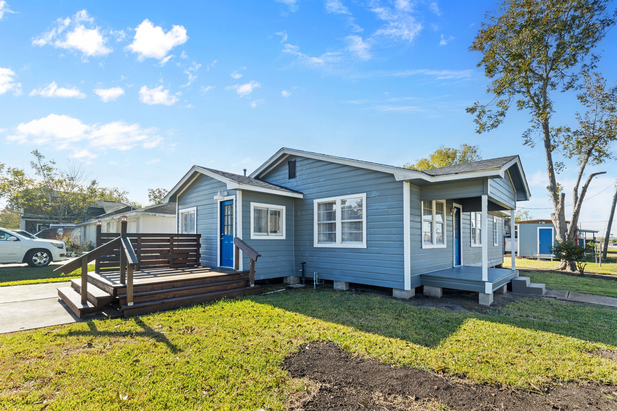 1051 Ave A Bacliff, TX 77518 - Photo 2 of 20 a view of a house with a yard