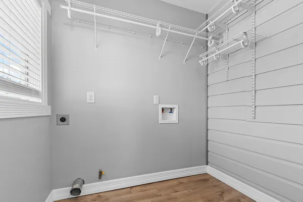 a view of a room with racks on the wall