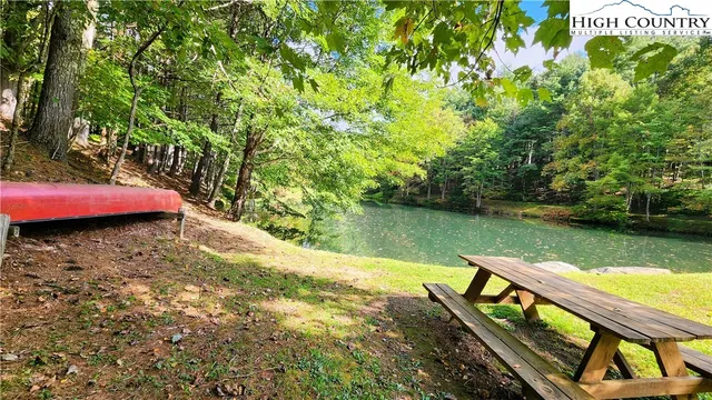 a view of a lake with a deck
