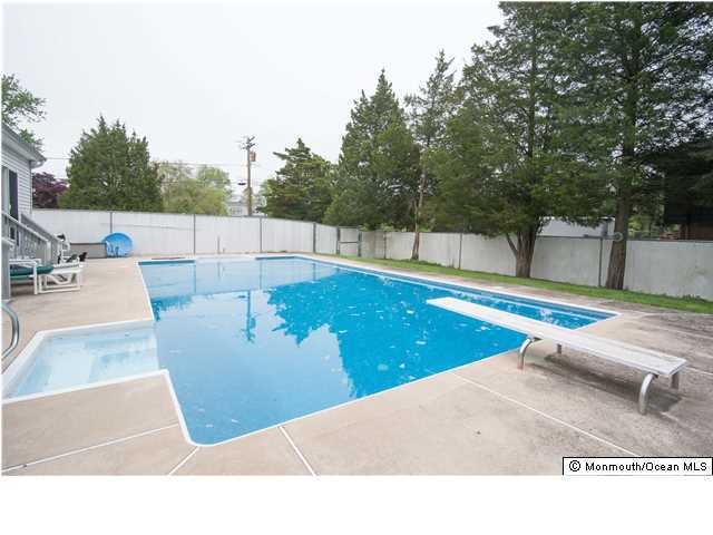 641 Hulses Corner Road Howell, NJ 07731 - Photo 18 of 21 a view of a swimming pool with a patio