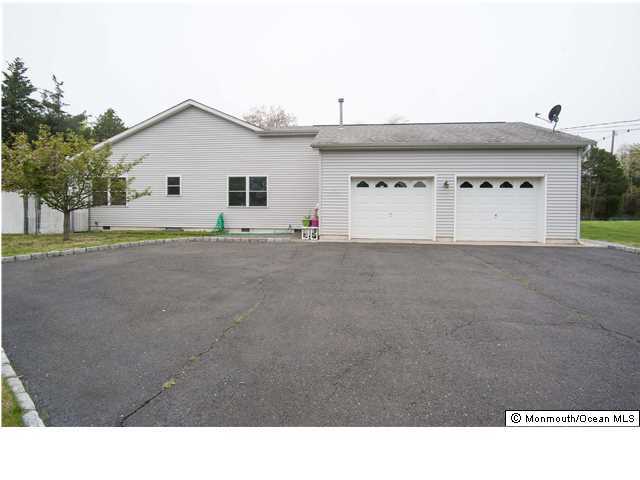 641 Hulses Corner Road Howell, NJ 07731 - Photo 21 of 21 a white house with a outdoor space