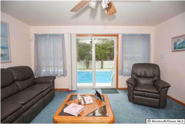 641 Hulses Corner Road Howell, NJ 07731 - Photo 6 of 21 a living room with furniture and a window