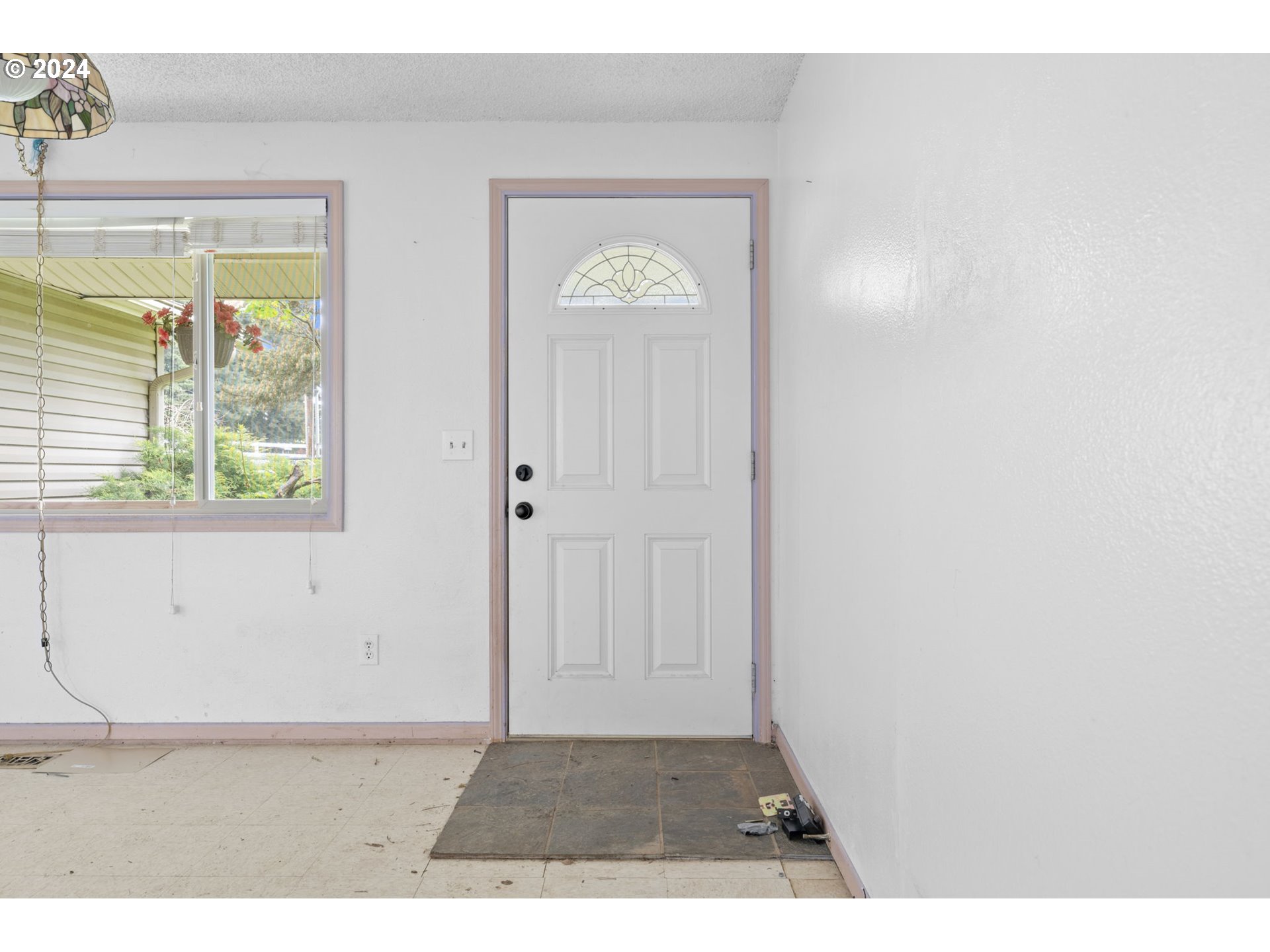 8707 Southeast Cottrell Road Boring, OR 97009 - Photo 4 of 44 a view of an entryway with wooden floor