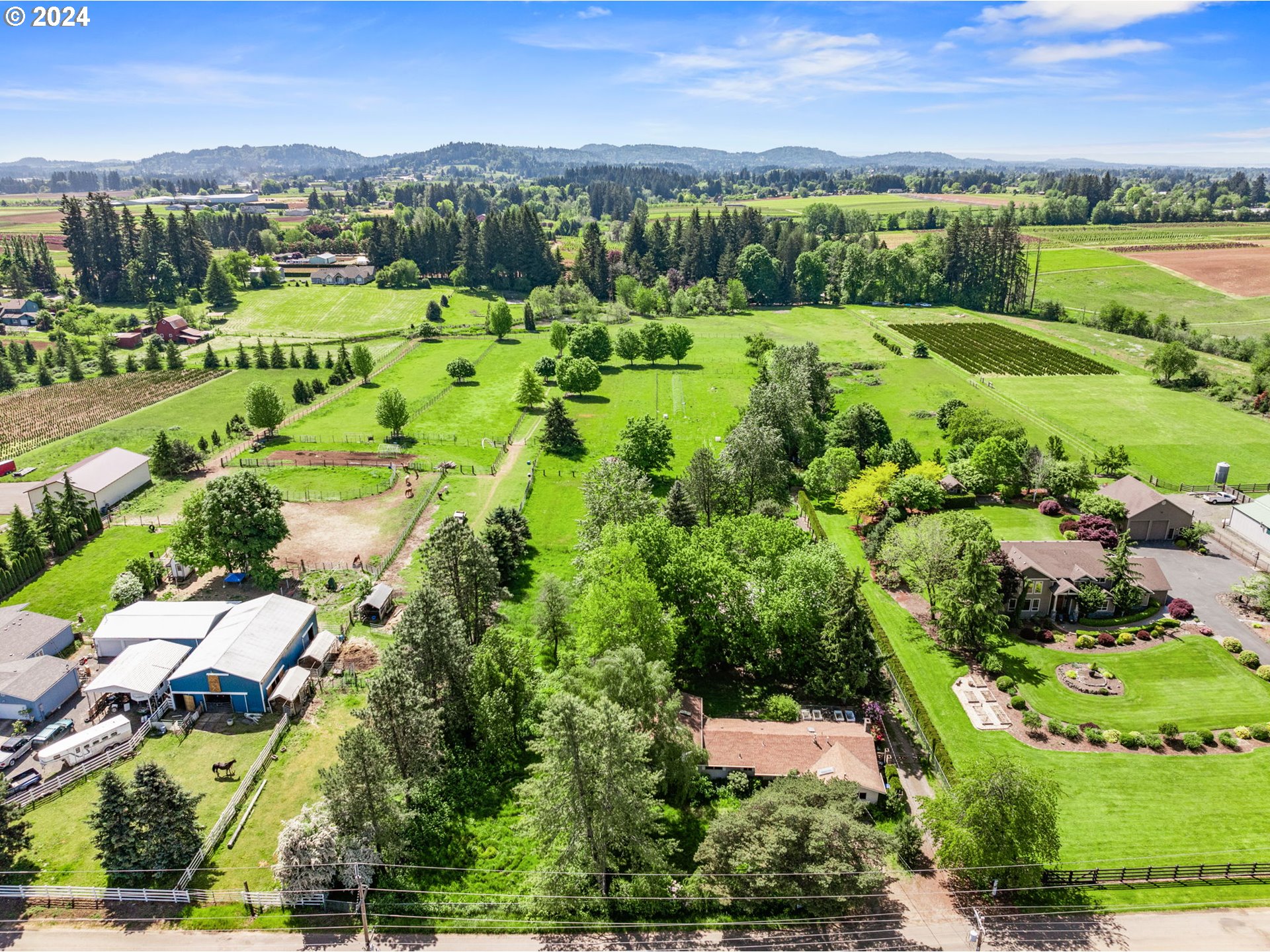 8707 Southeast Cottrell Road Boring, OR 97009 - Photo 41 of 44 an aerial view of a city with lots of residential buildings and mountain view in back