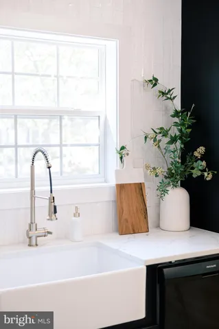 a white bath tub sitting in a bathroom
