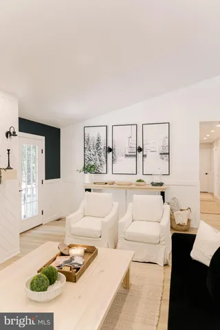 a bedroom with a bed and a night stand