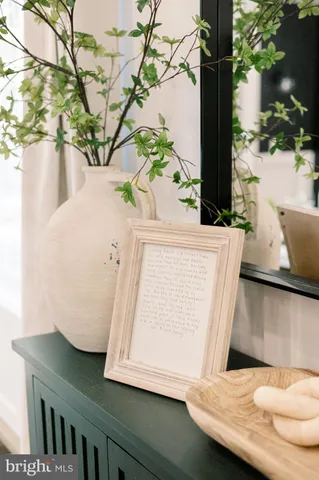 a view of a house with a yard and a garden
