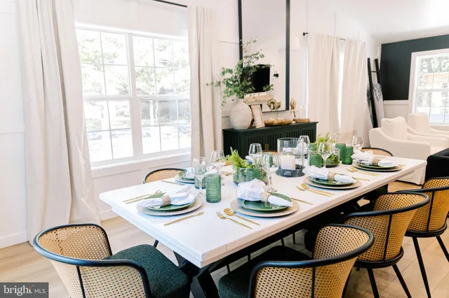 a kitchen with a sink refrigerator and window