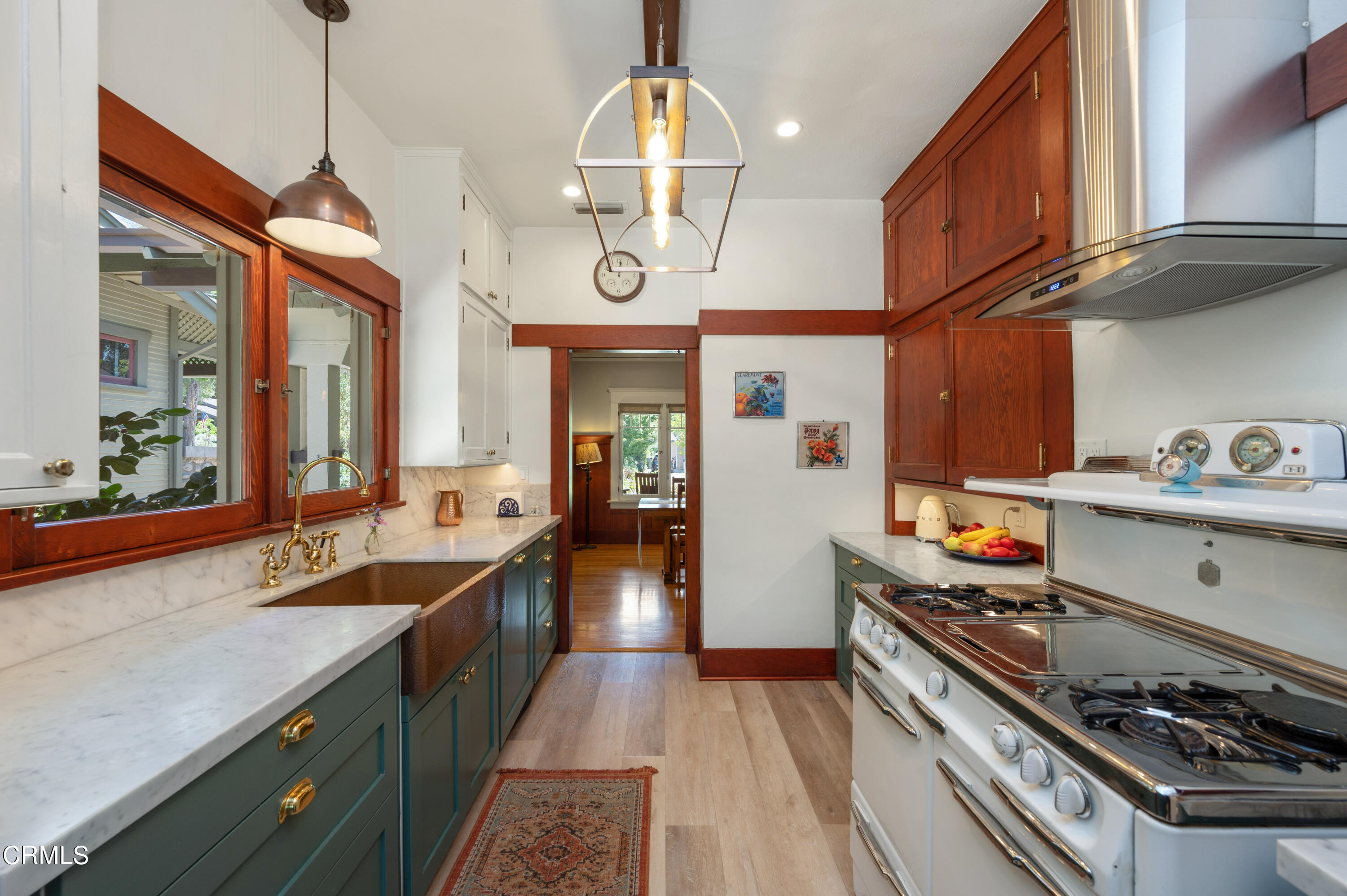 1265 North Wilson Avenue Pasadena, CA 91104 - Photo 11 of 48 a kitchen with stainless steel appliances granite countertop a sink and stove