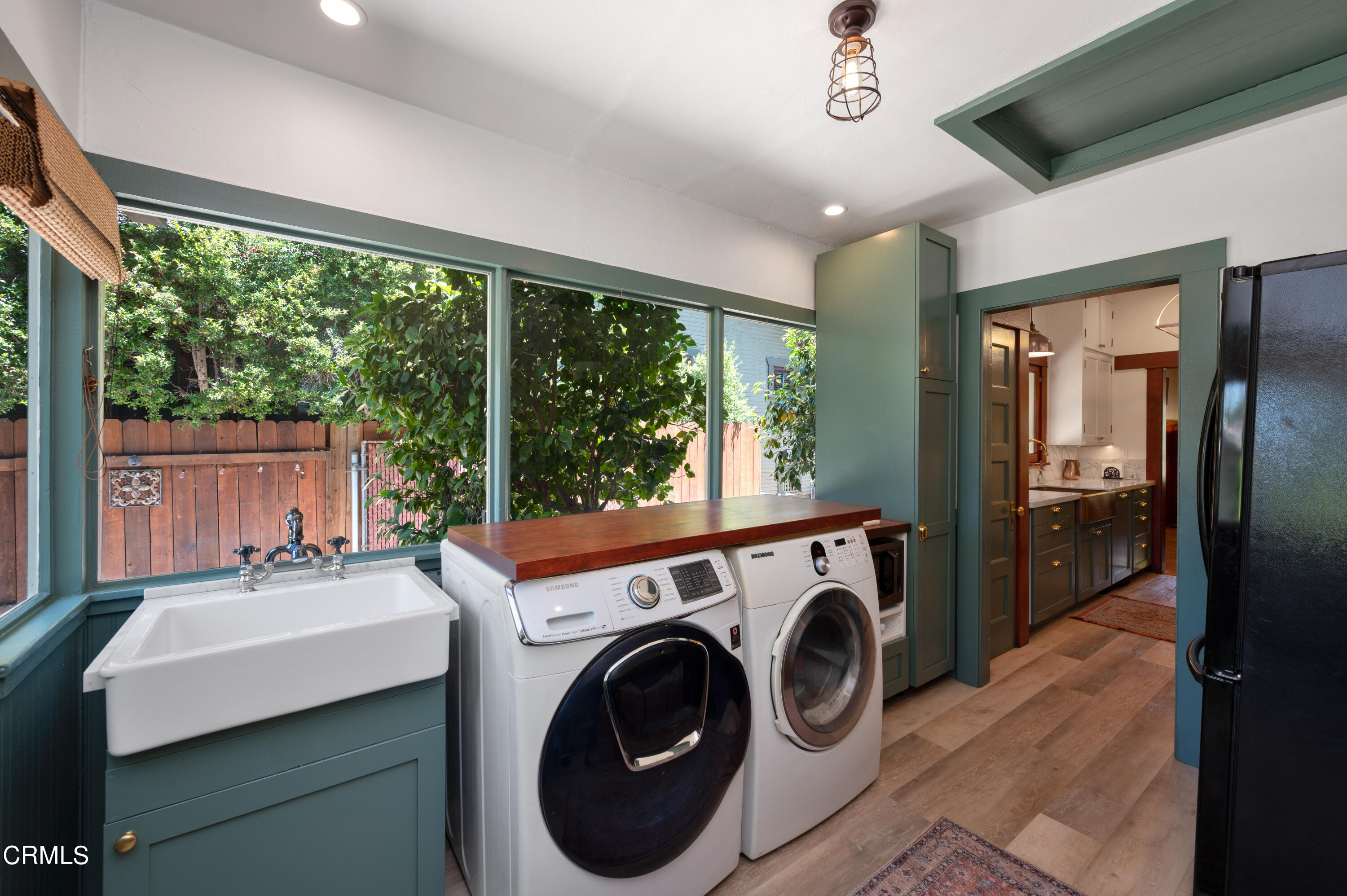 1265 North Wilson Avenue Pasadena, CA 91104 - Photo 13 of 48 a view of a sink and washer and dryer