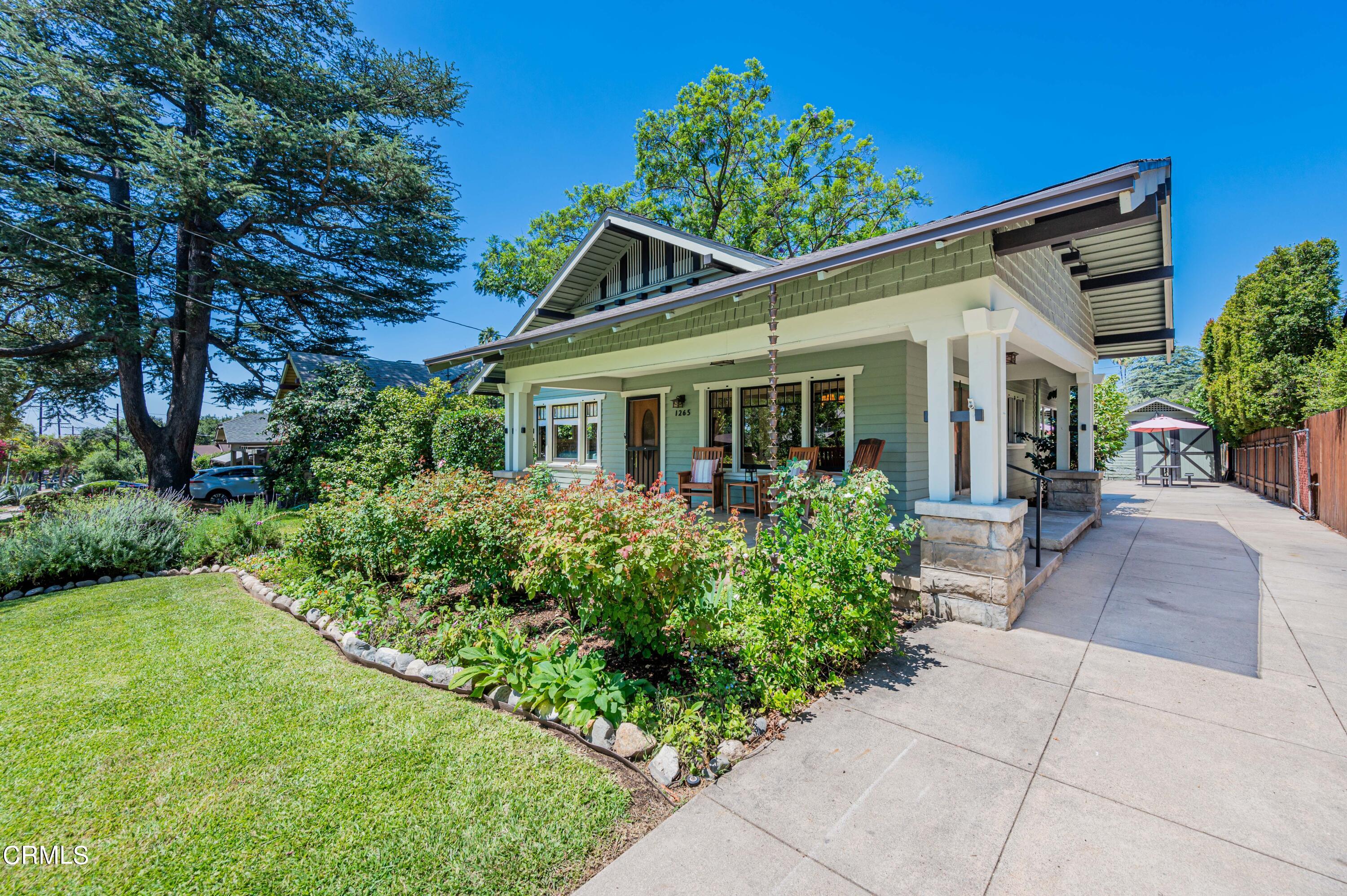 1265 North Wilson Avenue Pasadena, CA 91104 - Photo 2 of 48 front view of a house with a yard