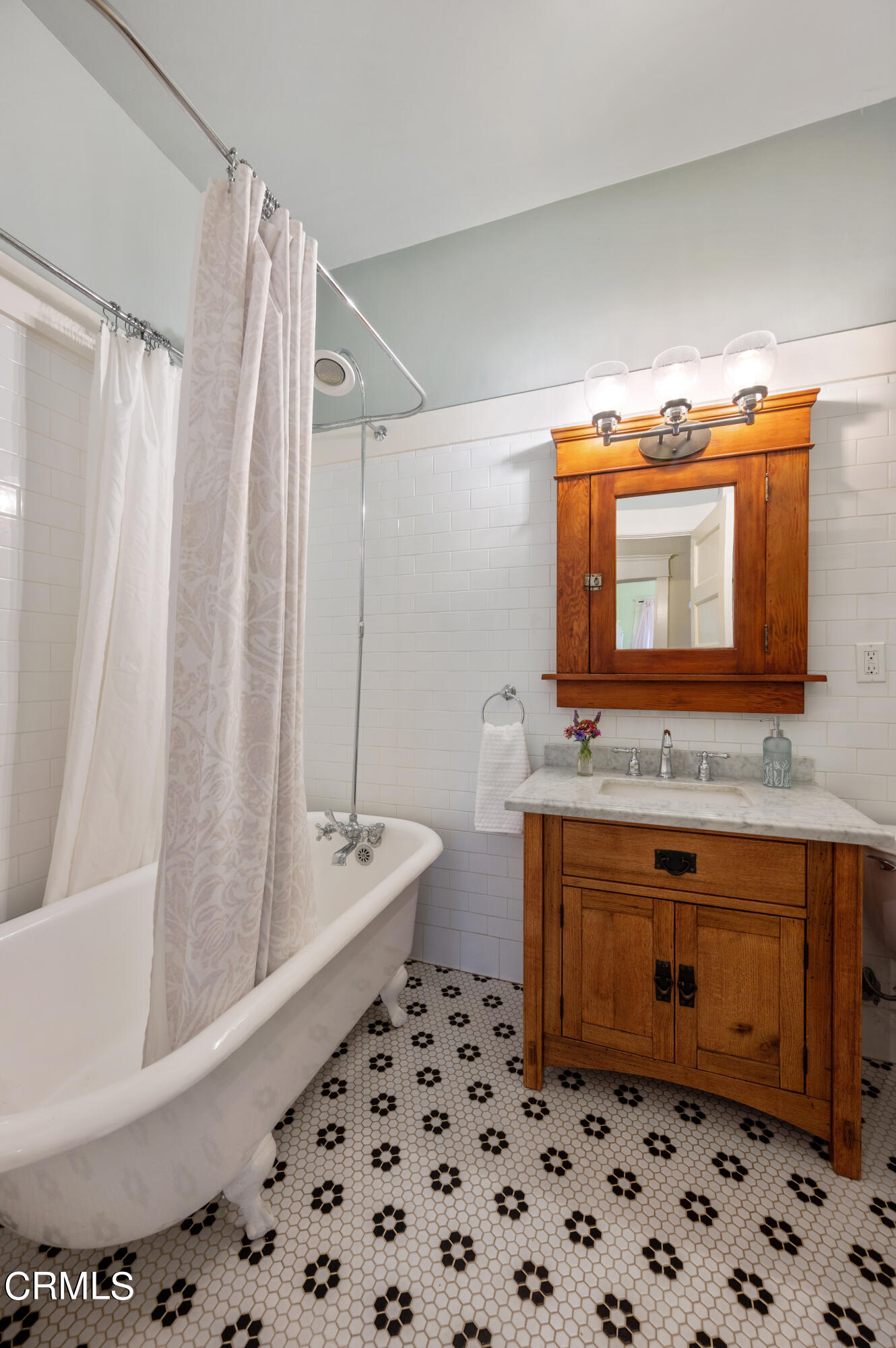 1265 North Wilson Avenue Pasadena, CA 91104 - Photo 21 of 48 a bathroom with a sink a toilet and a mirror