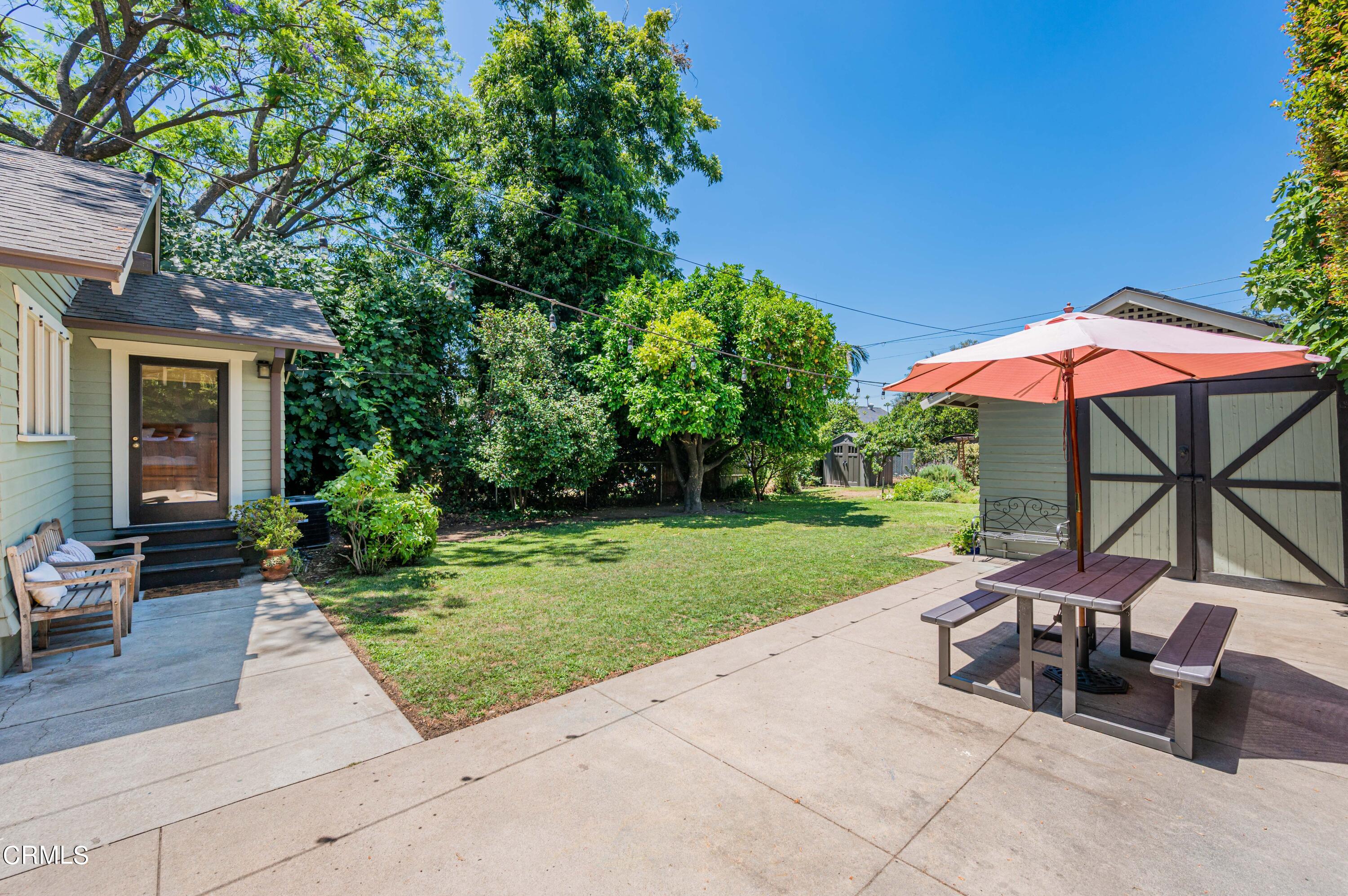 1265 North Wilson Avenue Pasadena, CA 91104 - Photo 26 of 48 a view of backyard with outdoor seating and green space