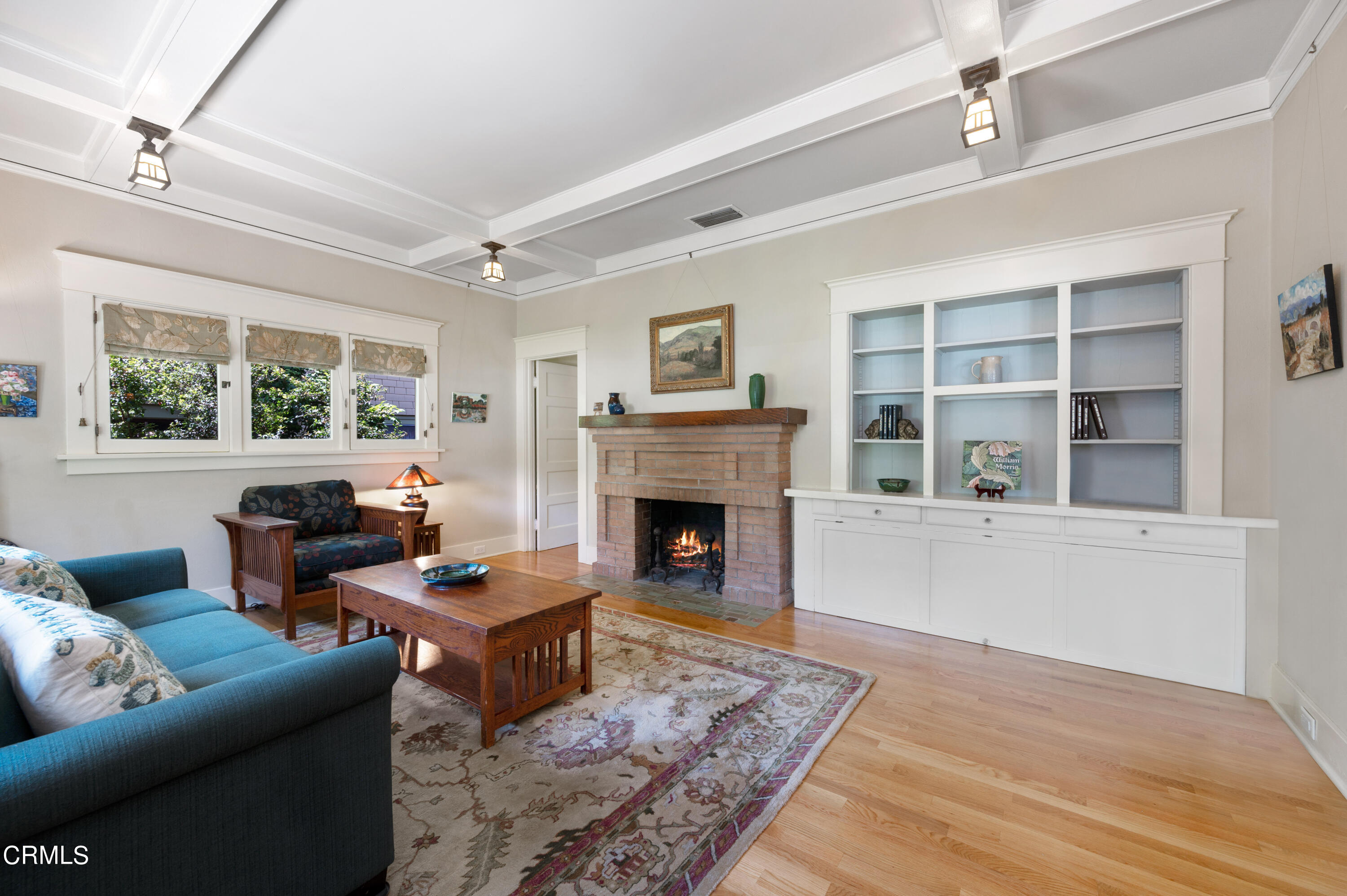 1265 North Wilson Avenue Pasadena, CA 91104 - Photo 3 of 48 a living room with furniture and a fireplace