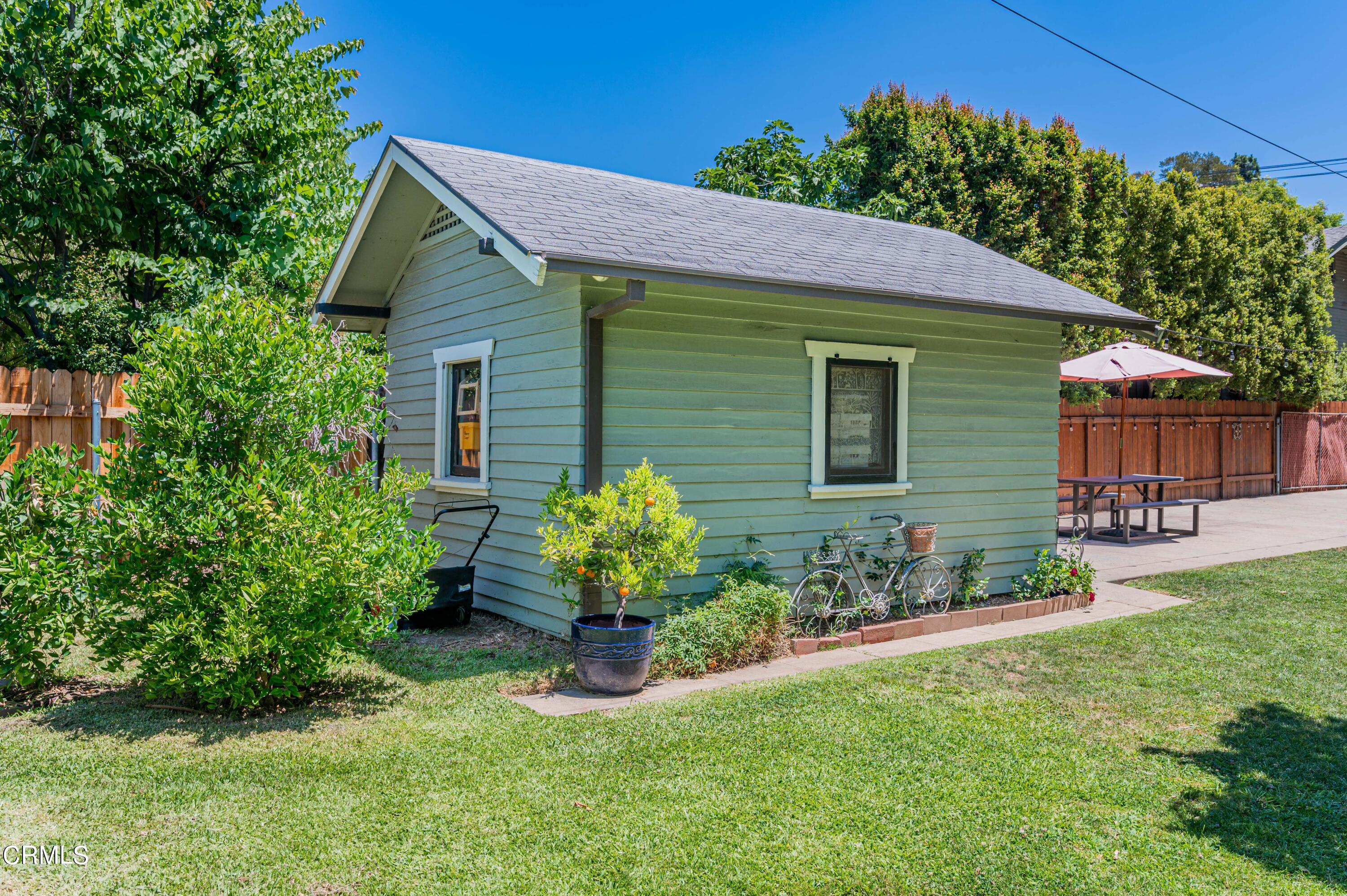 1265 North Wilson Avenue Pasadena, CA 91104 - Photo 34 of 48 a front view of a house with a yard
