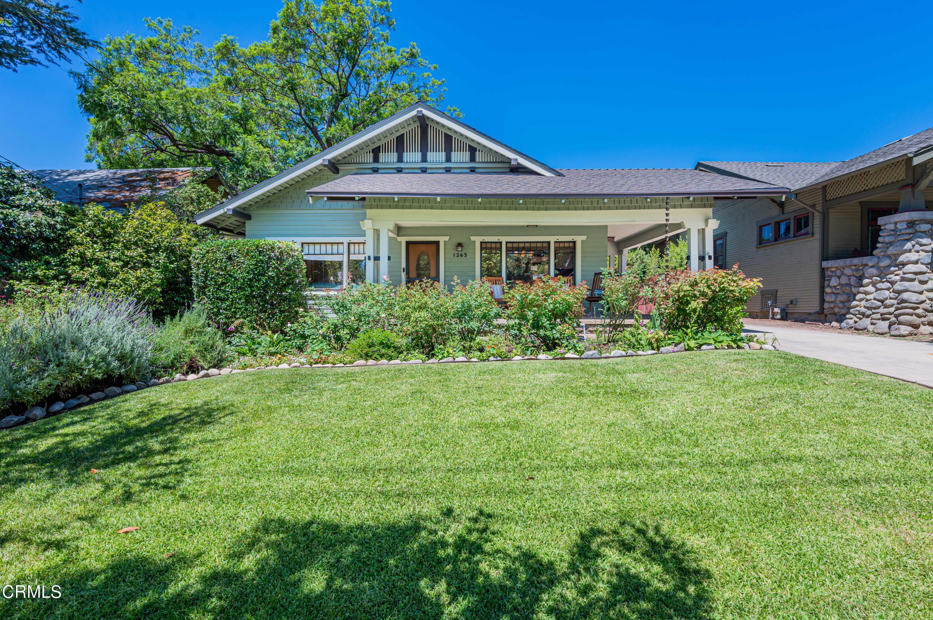 1265 North Wilson Avenue Pasadena, CA 91104 - Photo 37 of 48 a front view of a house with a yard