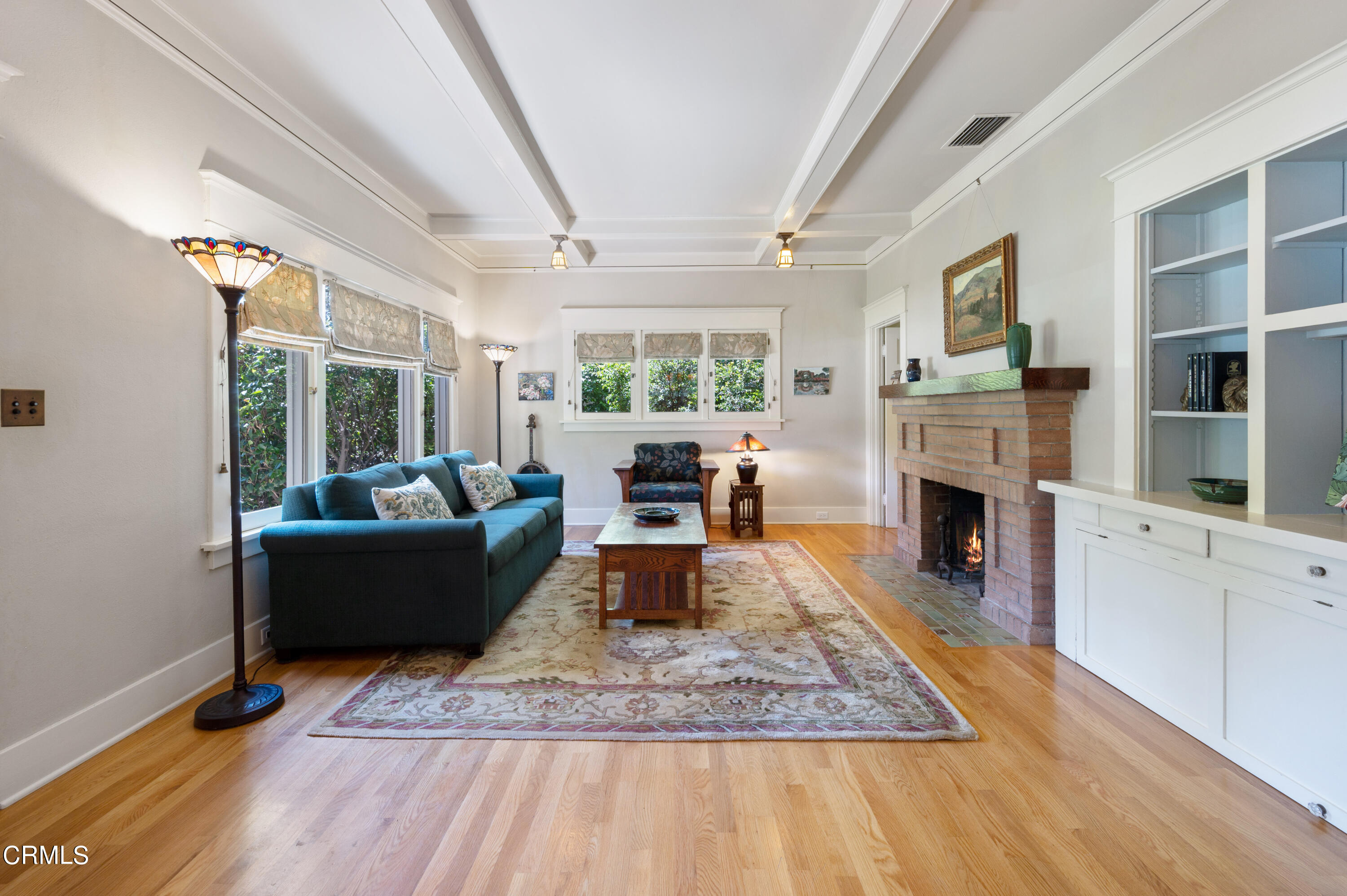 1265 North Wilson Avenue Pasadena, CA 91104 - Photo 5 of 48 a living room with furniture fireplace and a table