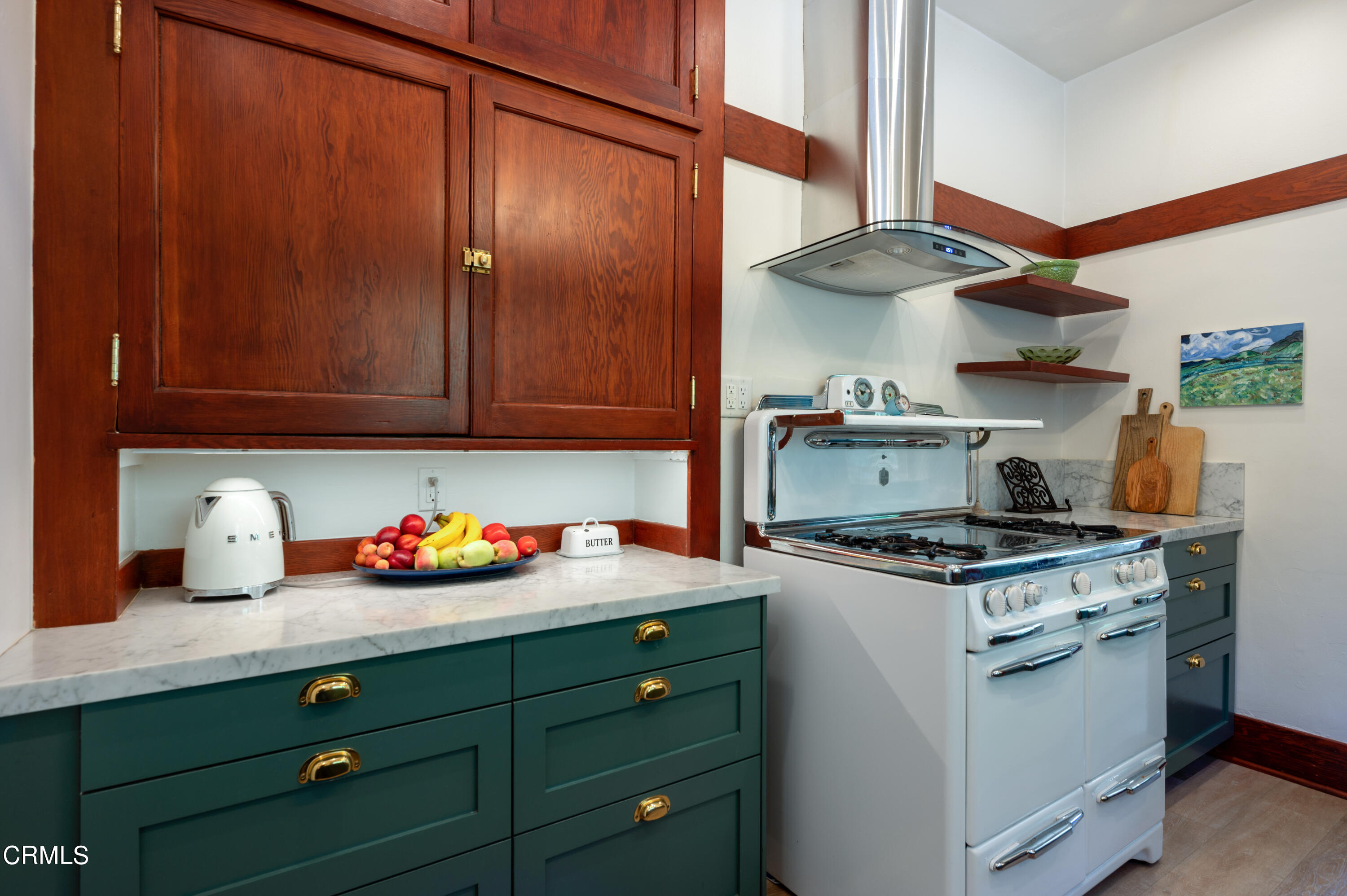 1265 North Wilson Avenue Pasadena, CA 91104 - Photo 10 of 48 a kitchen with stainless steel appliances granite countertop a stove a sink dishwasher and cabinets with wooden floor