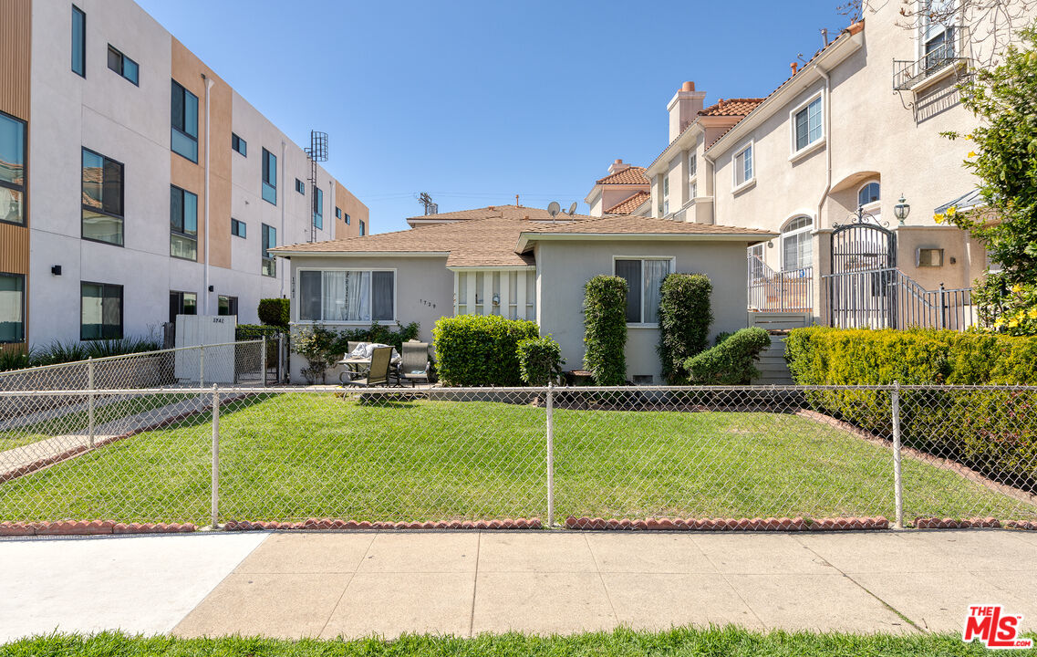 1739 Armacost Avenue Los Angeles, CA 90025 - Photo 1 of 3 a view of a house with a backyard porch and sitting area
