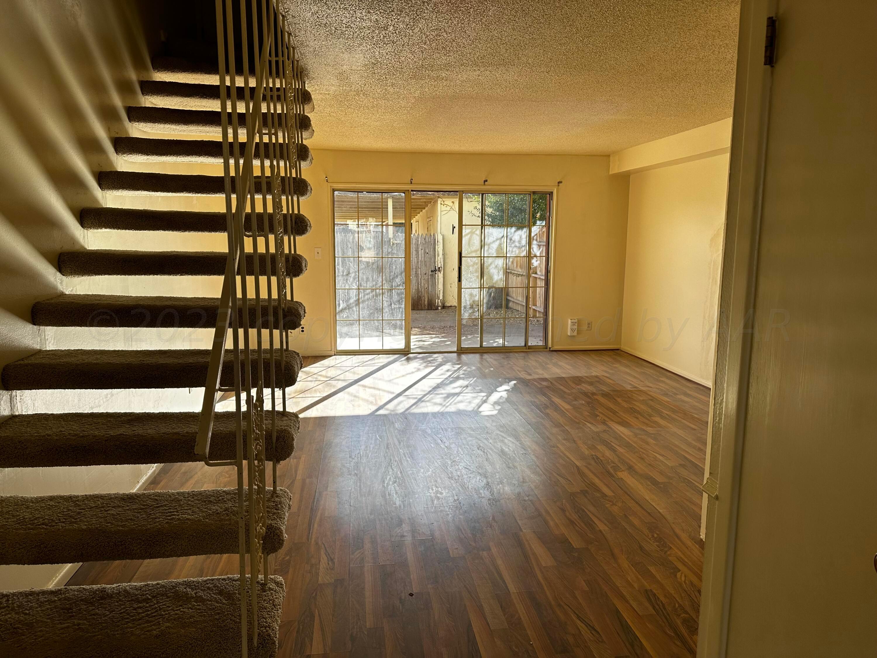 3219 Villa Place Amarillo, TX 79109 - Photo 4 of 13 a view of entryway with wooden floor