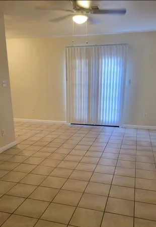 en empty room with a window