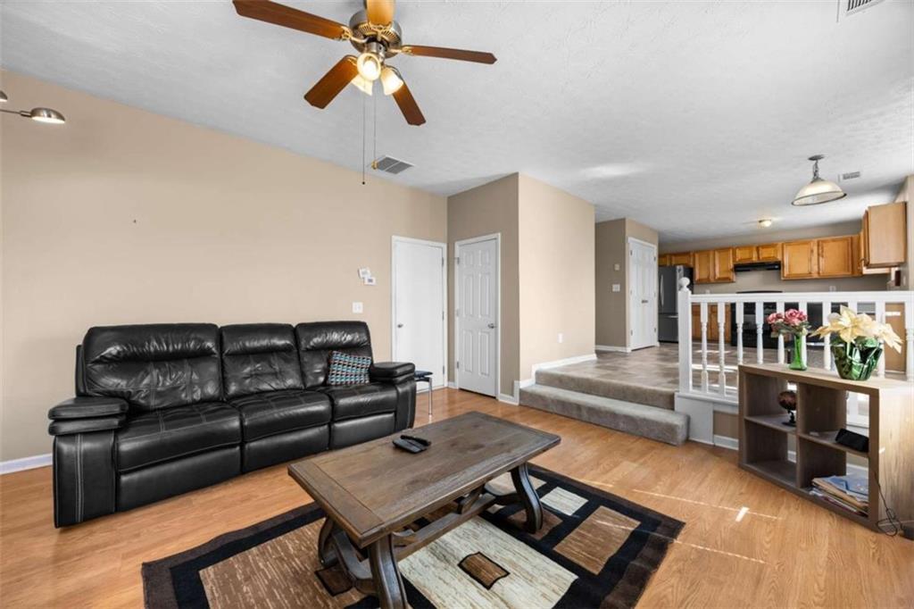 100 Adelaide Drive Covington, GA 30016 - Photo 14 of 33 a living room with furniture
