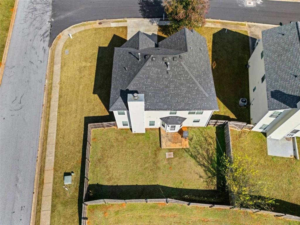 100 Adelaide Drive Covington, GA 30016 - Photo 2 of 33 an aerial view of a swimming pool