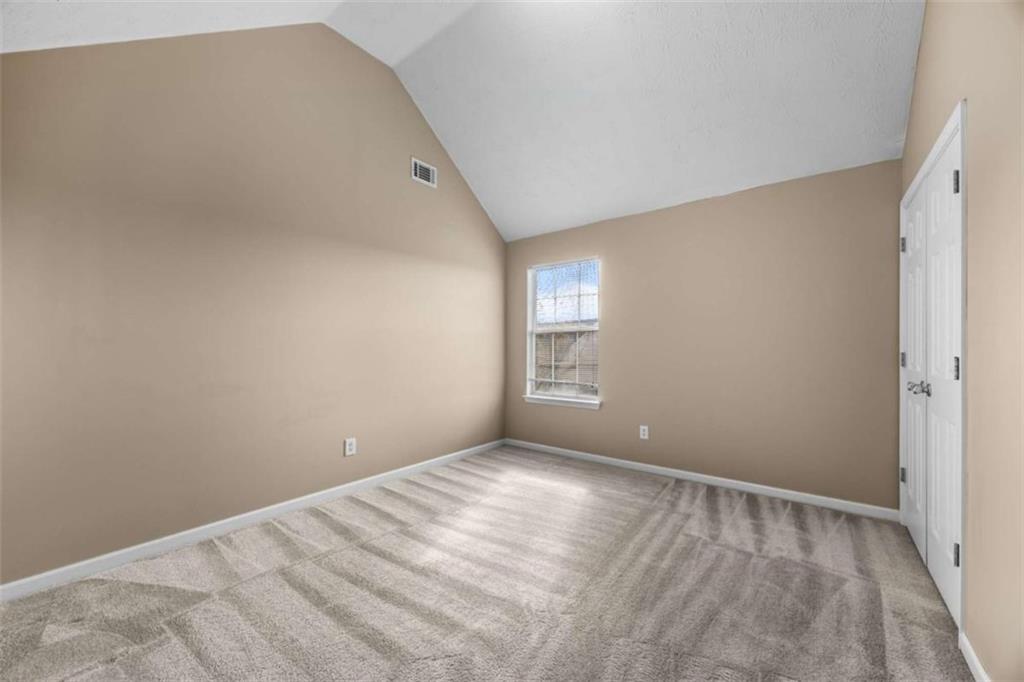 100 Adelaide Drive Covington, GA 30016 - Photo 22 of 33 a view of empty room with window