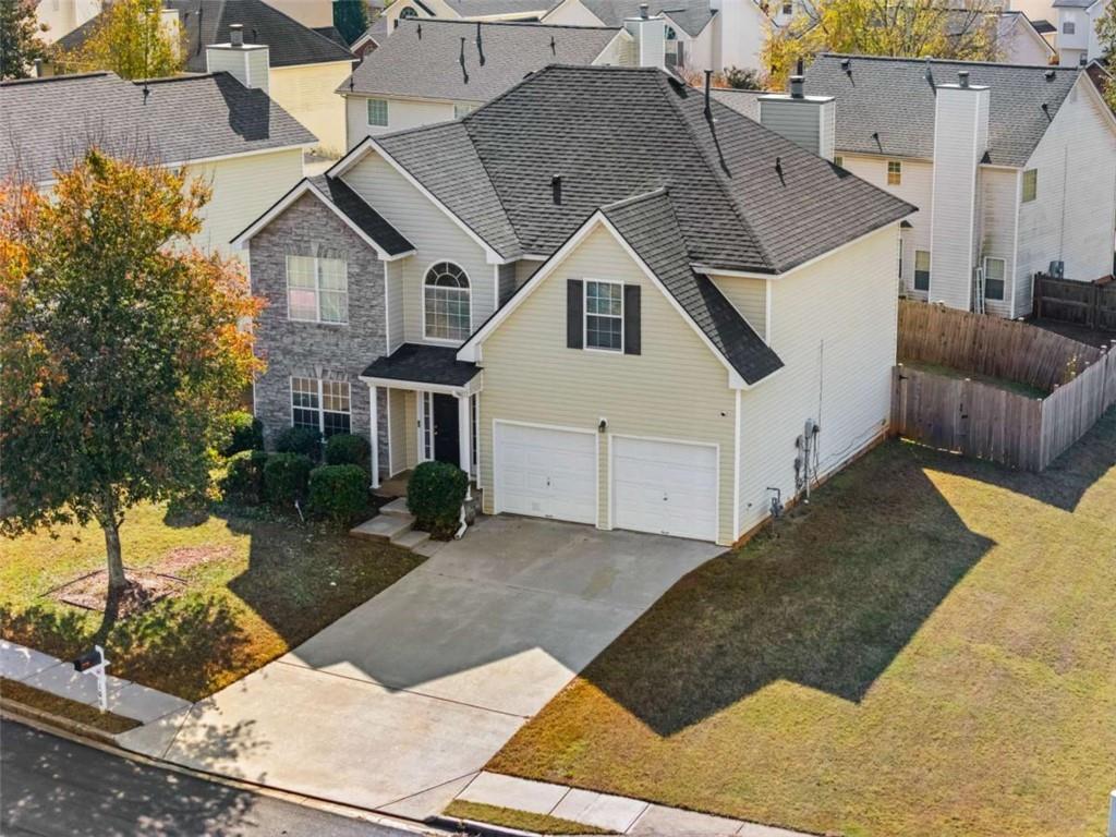 100 Adelaide Drive Covington, GA 30016 - Photo 28 of 33 a aerial view of a house with a yard
