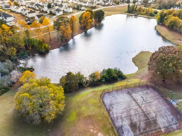 a view of a lake with a swimming pool