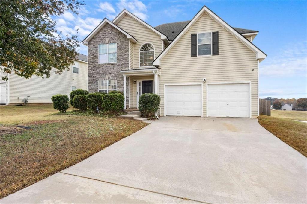 100 Adelaide Drive Covington, GA 30016 - Photo 33 of 33 a view of garage and yard
