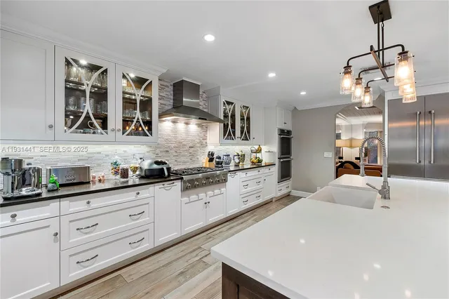 a view of a house with swimming pool and sitting area