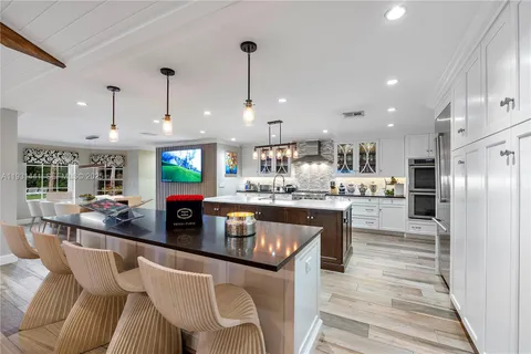 a view of a chairs and table in a room