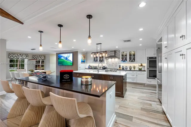 a view of a chairs and table in a room
