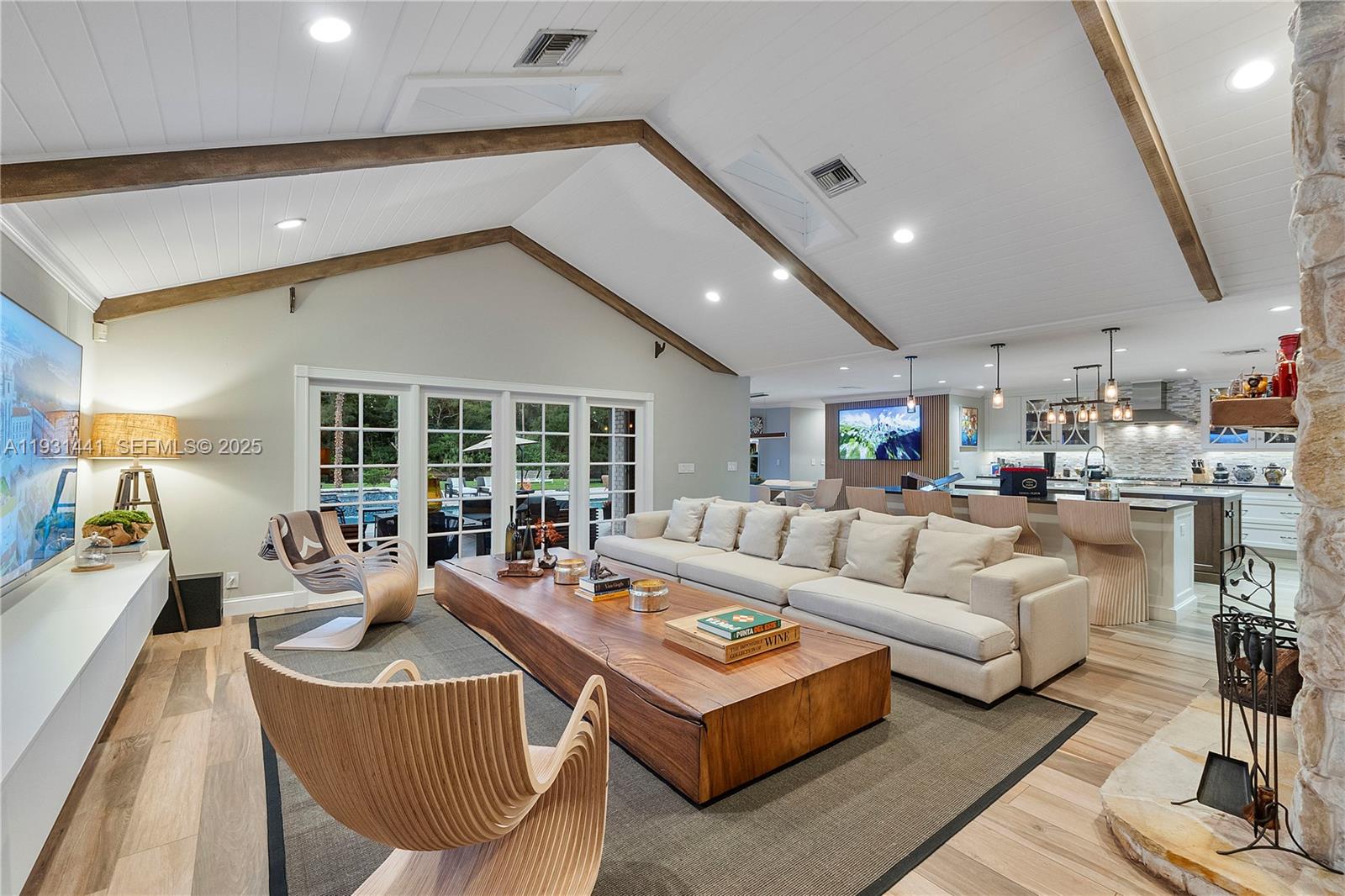 8020 Northwest 47th Drive Coral Springs, FL 33067 - Photo 25 of 83 a living room with furniture and a large window