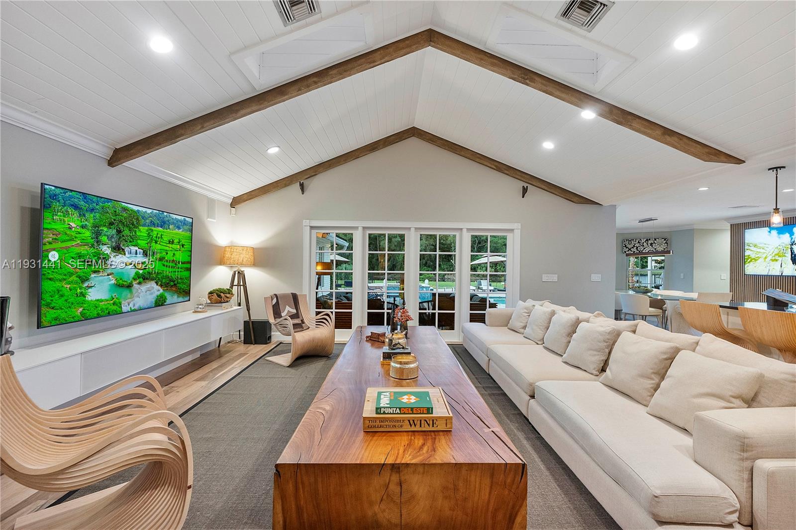 8020 Northwest 47th Drive Coral Springs, FL 33067 - Photo 26 of 83 a living room with furniture and a large window