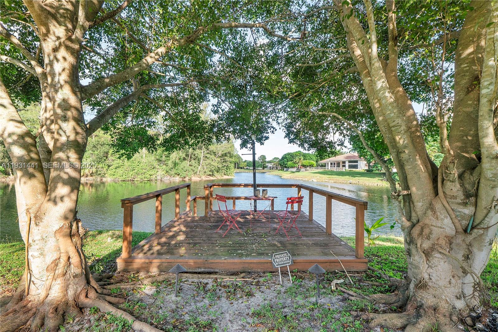 8020 Northwest 47th Drive Coral Springs, FL 33067 - Photo 50 of 83 a view of a house with backyard and sitting area