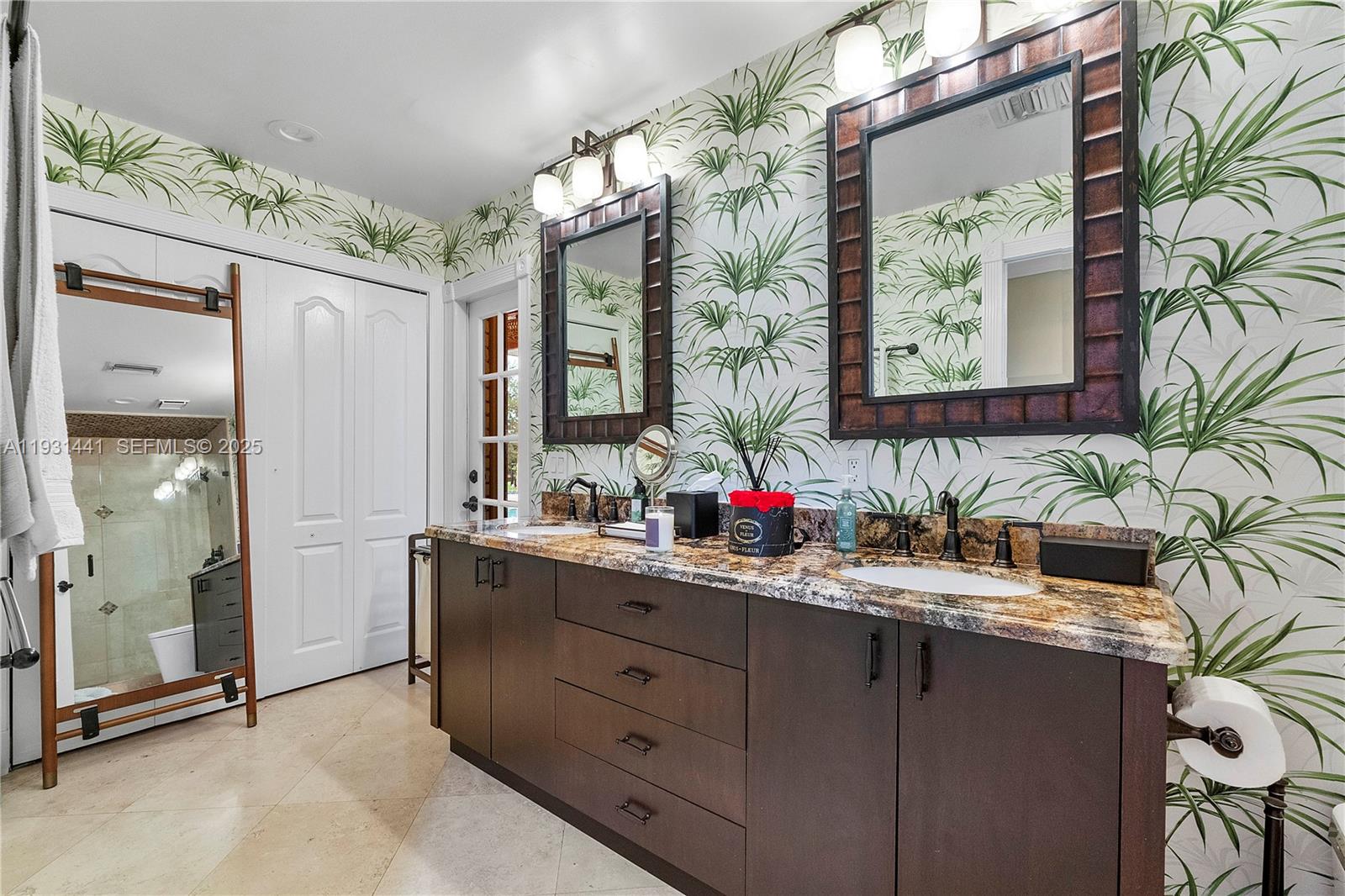 8020 Northwest 47th Drive Coral Springs, FL 33067 - Photo 66 of 83 a bathroom with a granite countertop sink mirror and shower