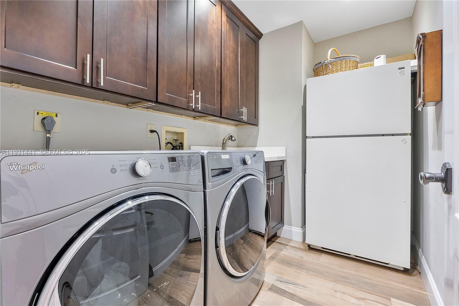 8020 Northwest 47th Drive Coral Springs, FL 33067 - Photo 73 of 83 a utility room with dryer and washer