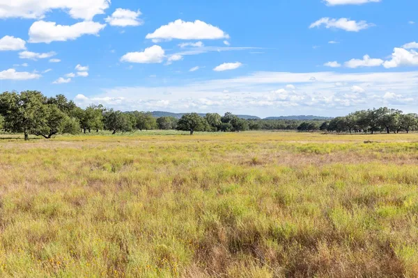 a view of an outdoor space and a yard