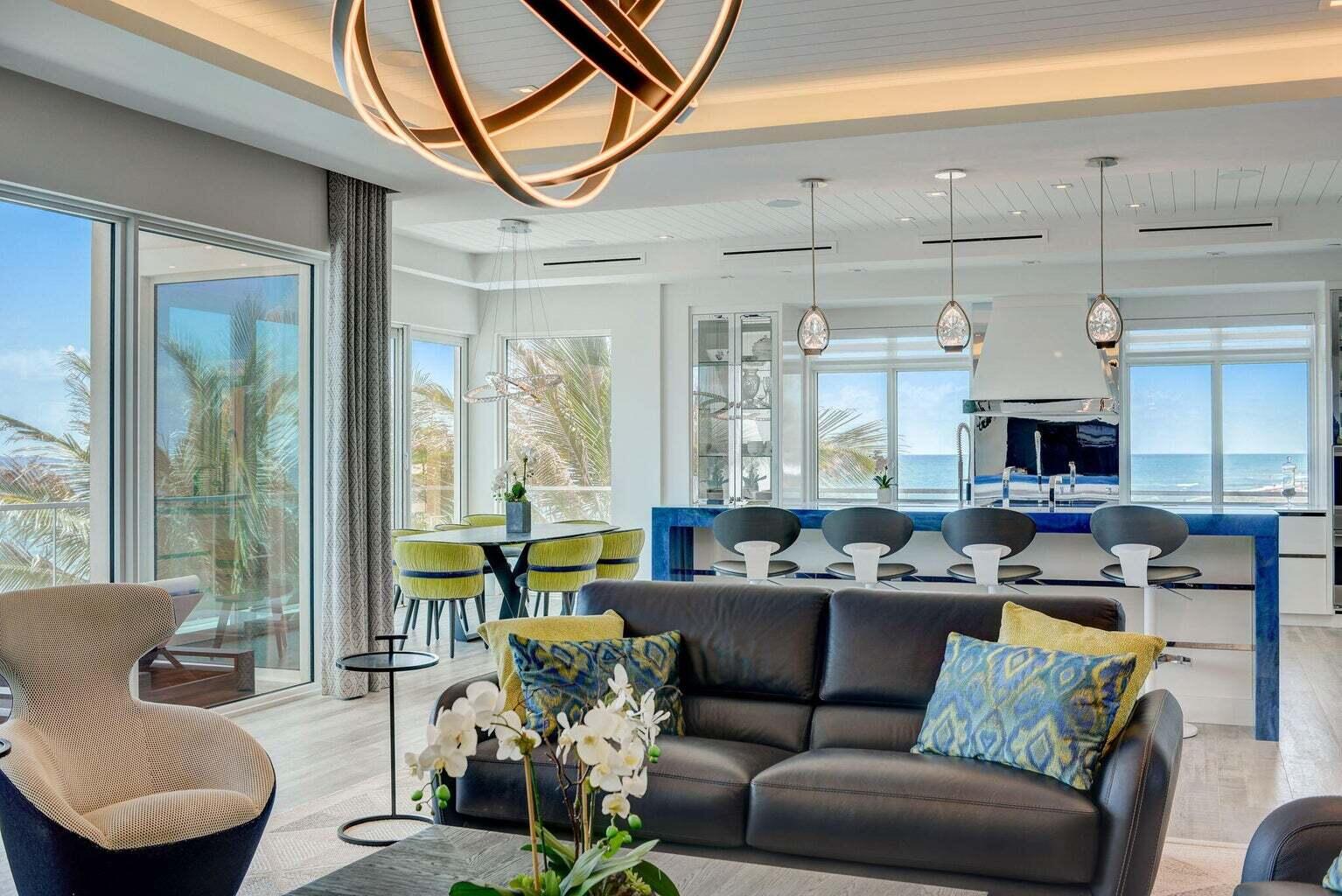 5001 Old Ocean Boulevard Ocean Ridge, FL 33435 - Photo 14 of 66 a living room with furniture and a floor to ceiling window