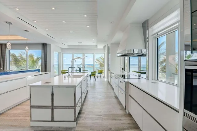 a kitchen with stainless steel appliances cabinets and a counter top space