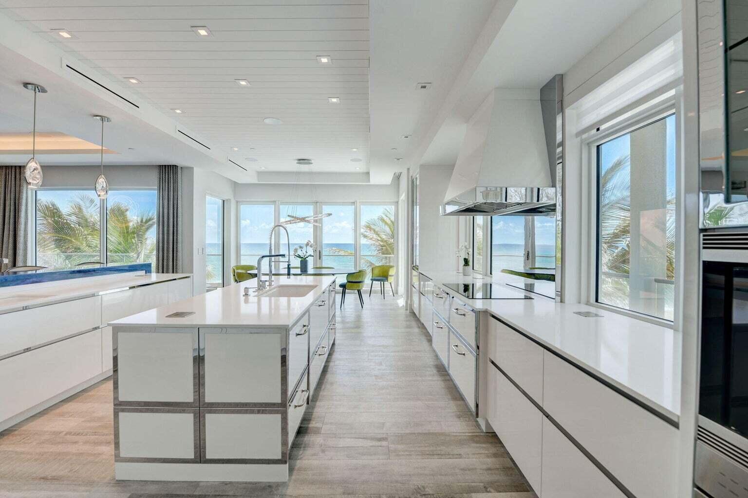 5001 Old Ocean Boulevard Ocean Ridge, FL 33435 - Photo 19 of 66 a large kitchen with kitchen island a large window