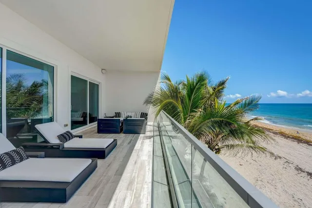 a spacious bedroom with a bed and a couch