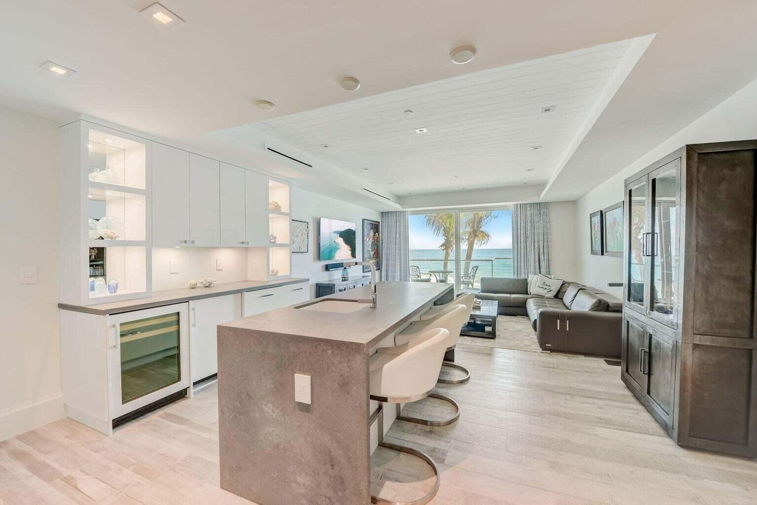 5001 Old Ocean Boulevard Ocean Ridge, FL 33435 - Photo 48 of 66 a large kitchen with stainless steel appliances lots of counter space and windows