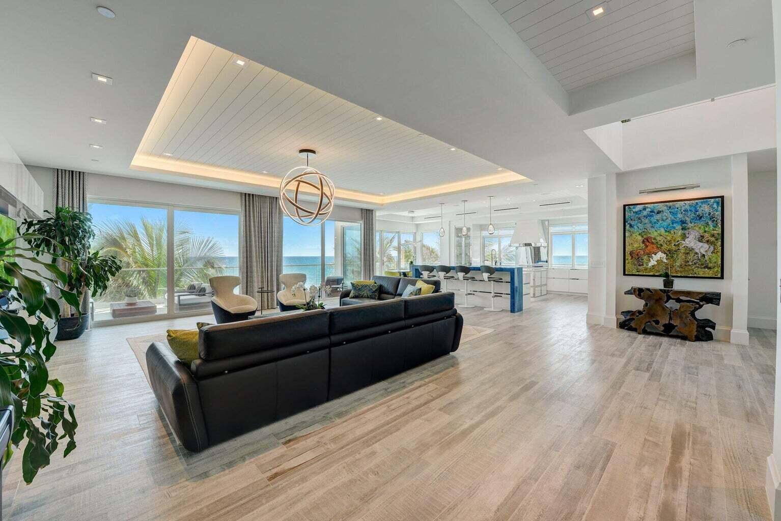 5001 Old Ocean Boulevard Ocean Ridge, FL 33435 - Photo 8 of 66 a living room with furniture and a large window