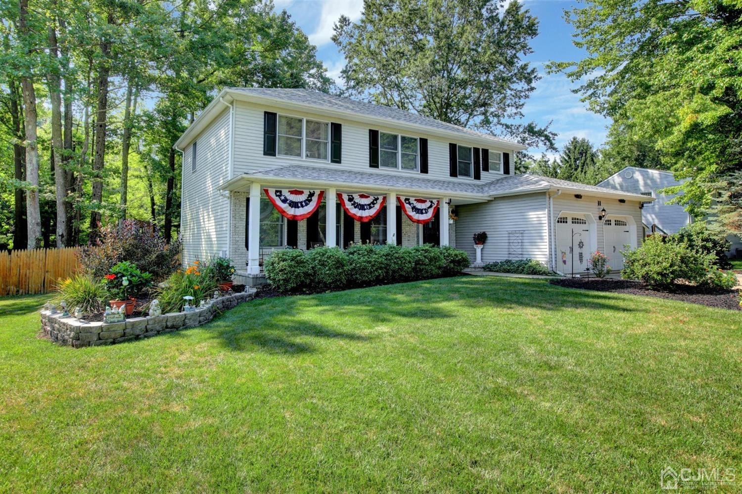 11 Walnut Court Old Bridge, NJ 07747 - Photo 1 of 32 a front view of a house with a garden and yard
