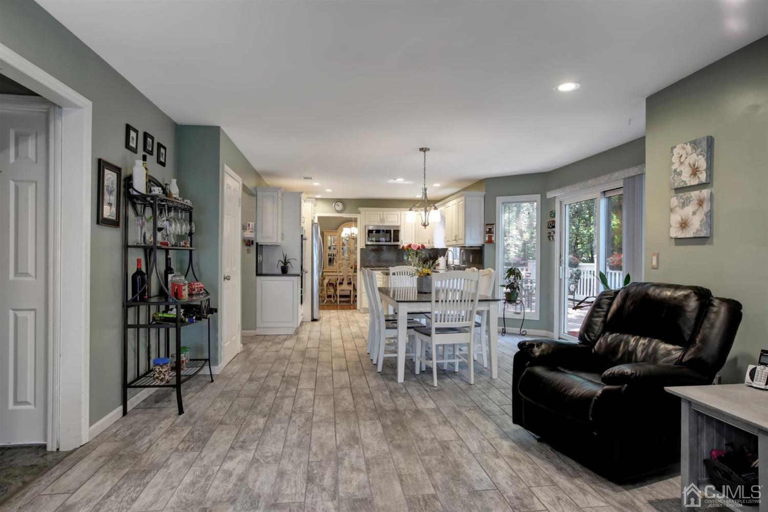 11 Walnut Court Old Bridge, NJ 07747 - Photo 14 of 32 a living room with furniture and a wooden floor